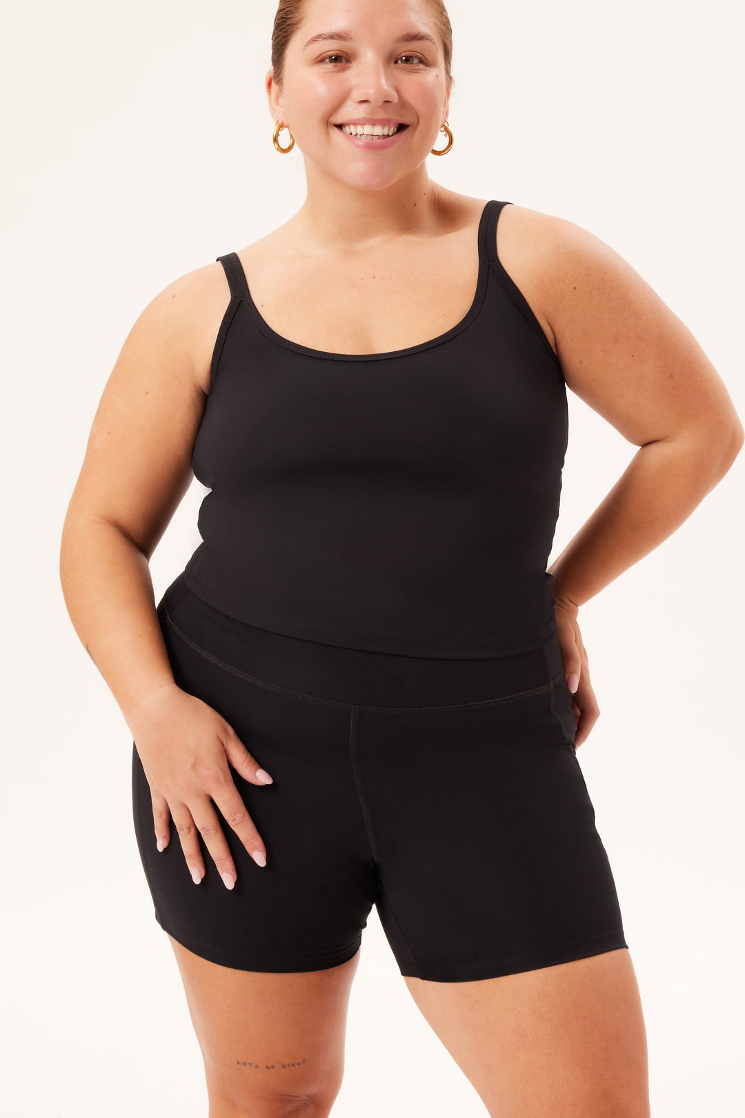 High-rise running shorts in black showing flexible waistband for secure, comfortable fit