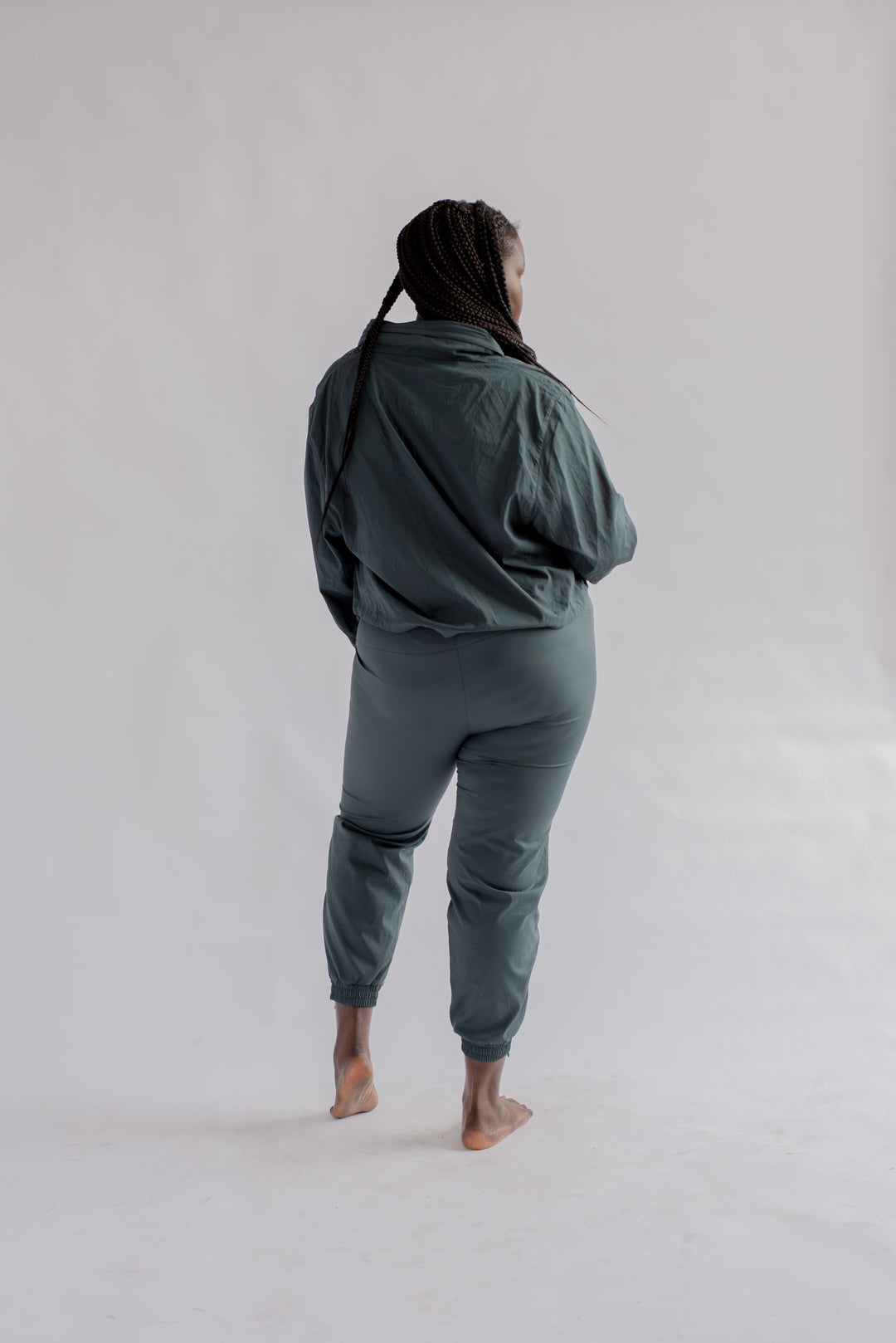 Back view of Summit Track Pants in Moss