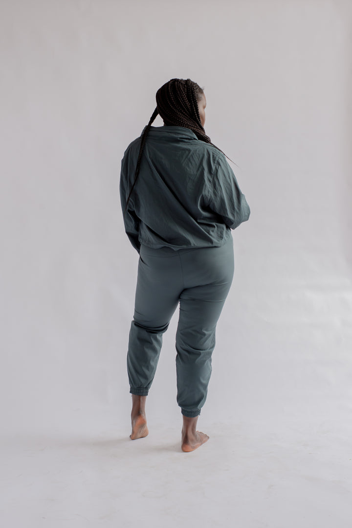 Back view of Summit Track Pants in Moss