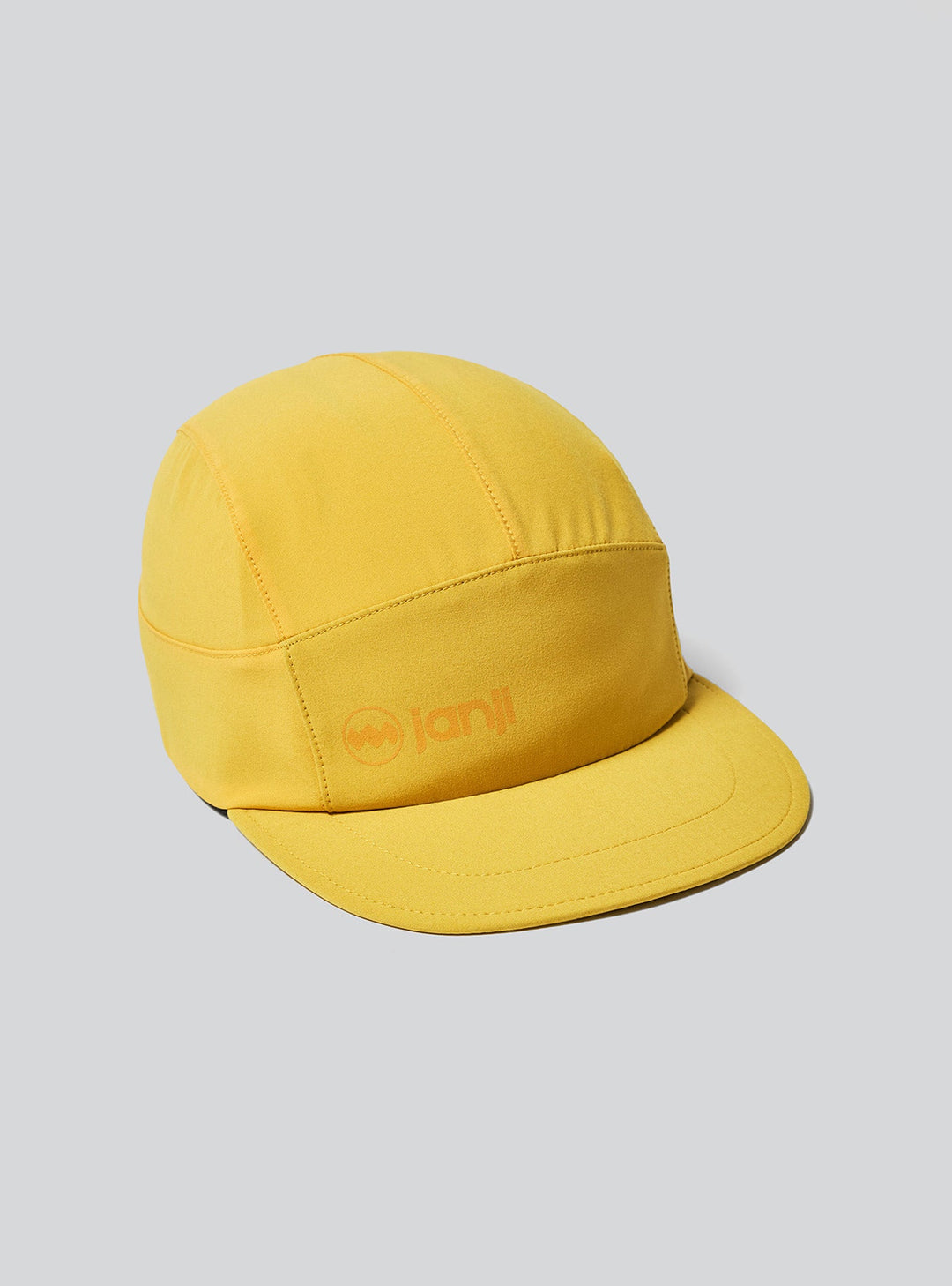 Angled view of Janji AFO Hyperlight cap with reflective bungee fit