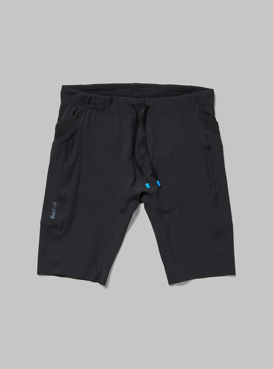 Flatlay, Janji men’s half tights in Midnight