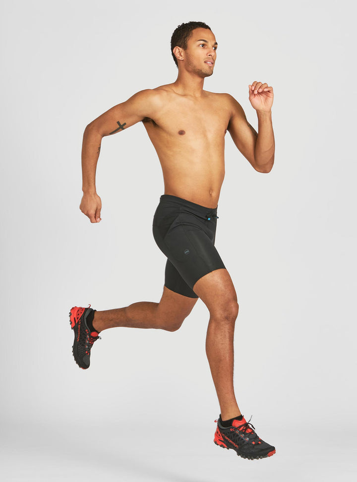 Janji M's 8 inch trail half tight in motion – trail running use