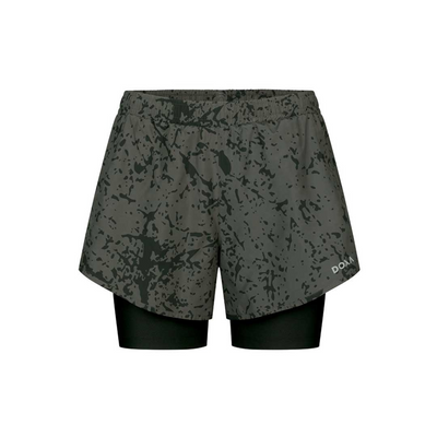 Women's Doxa Salma 2 in 1 Running Shorts, front view. medium length black inner tights. 3 inch length shorts as the outer layer in cypress green with darker graphic paint splat style print all over. Elastic waistband. DOXA logo print on the side of the bottom left leg.